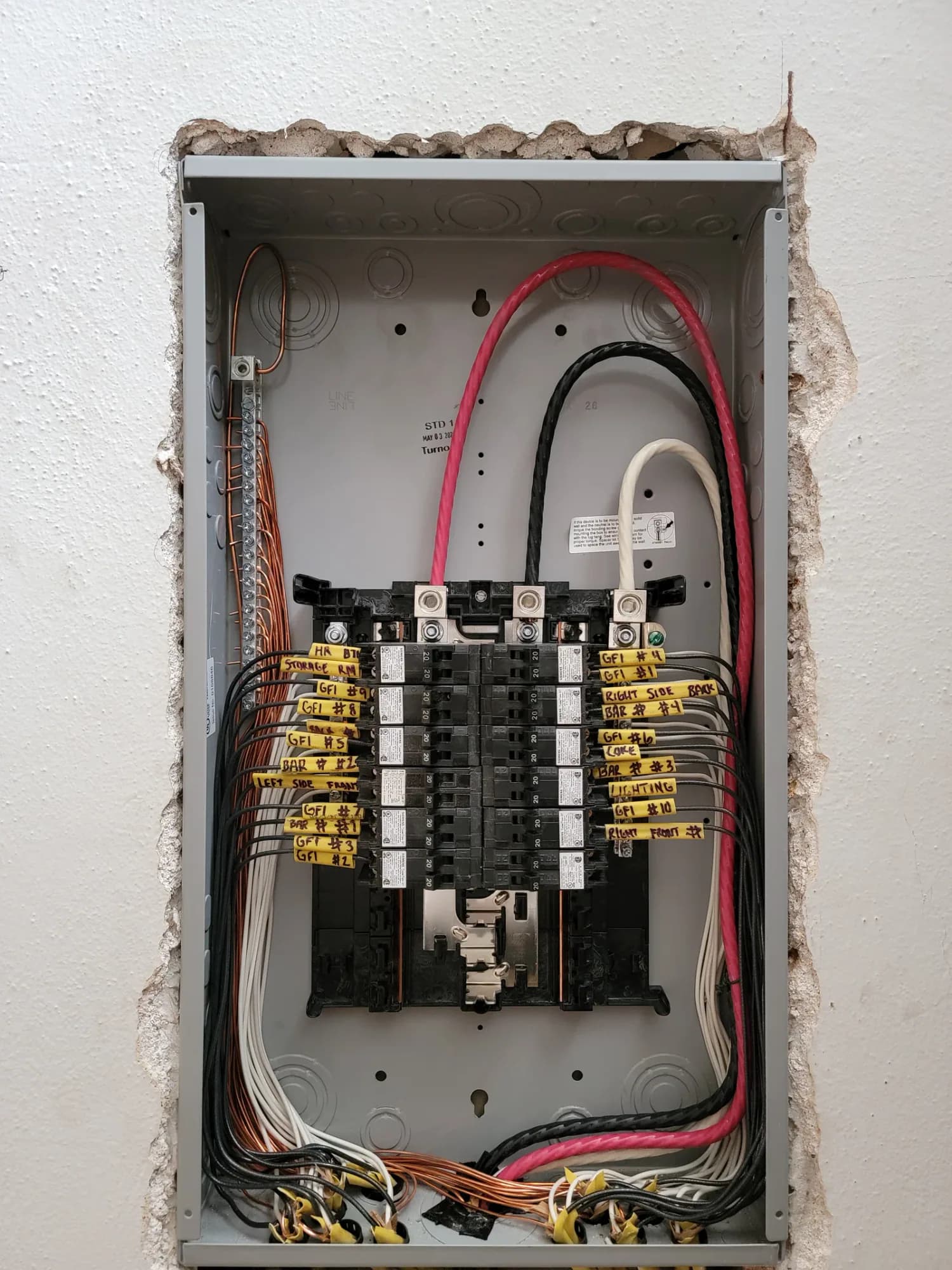 Electrical panel and labeled circuits at a Monterey bar