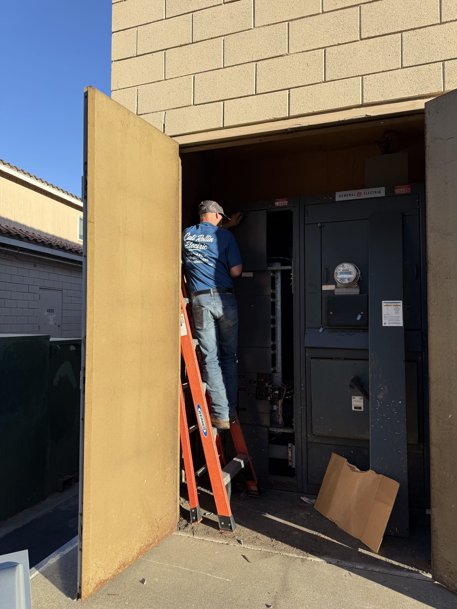 Cali Rollin Electric dismantling old switchgear during a commercial service upgrade