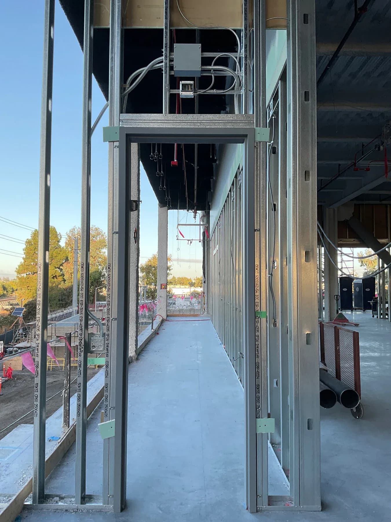 Conduit installed through the framing of a commercial building