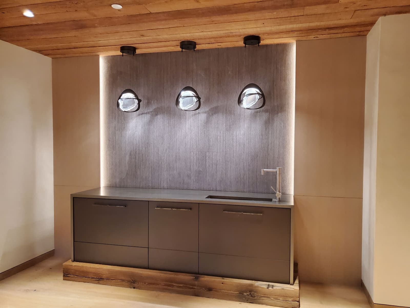 Vanity lights installed above cabinetry