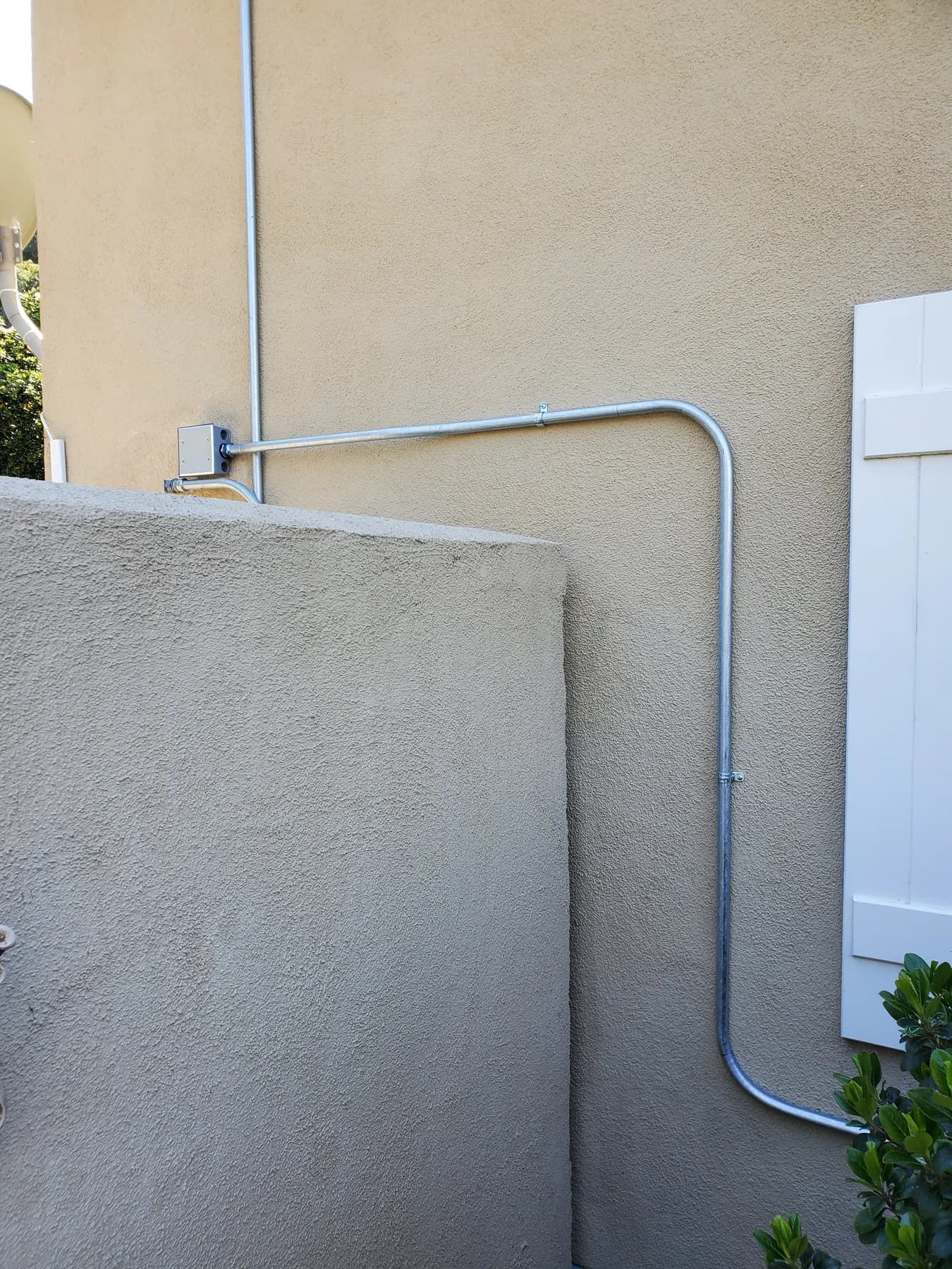 Junction box accessible near a panel during dryer outlet relocation