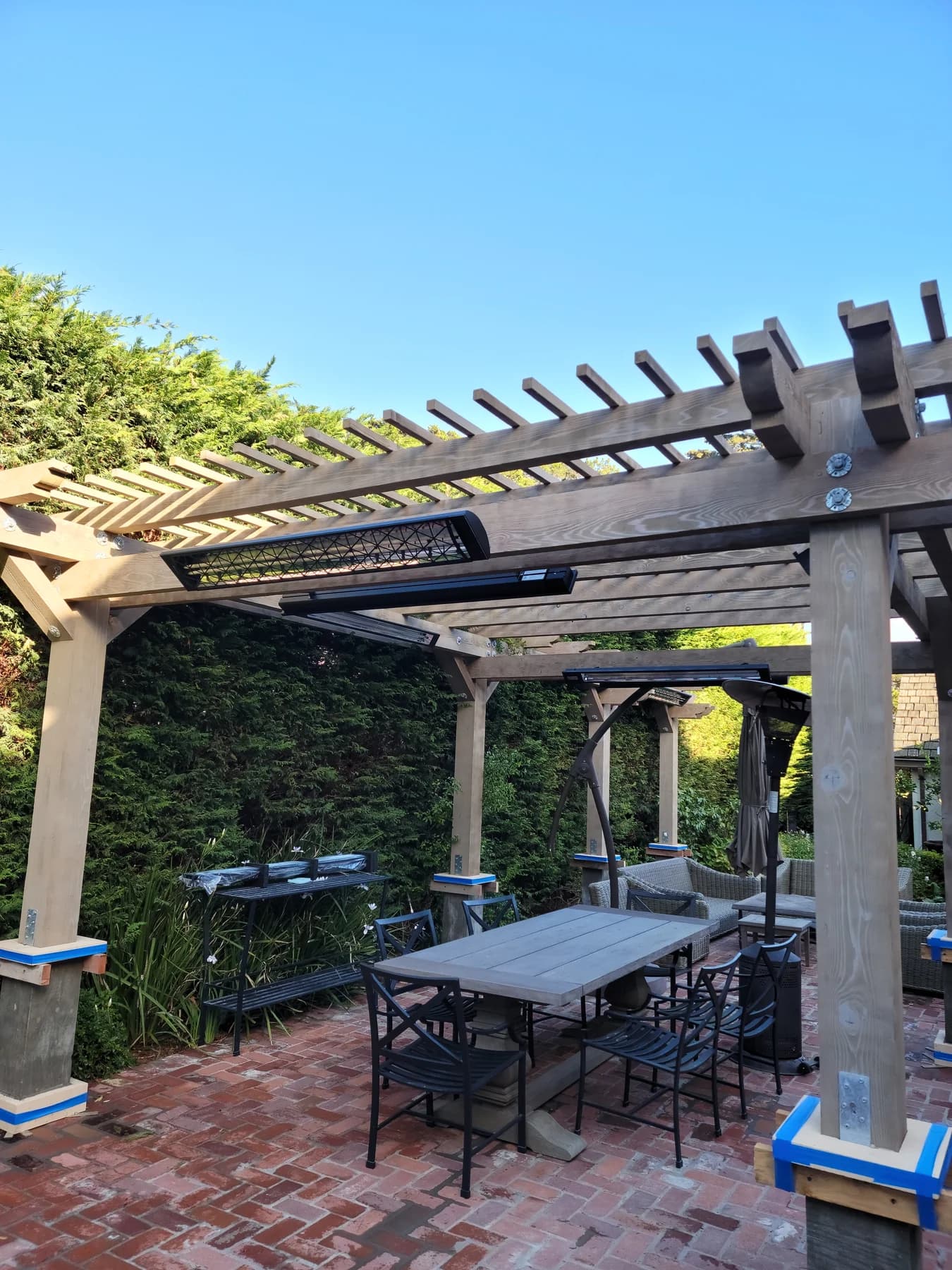 Fixed Infratech radiant heaters under a pergola