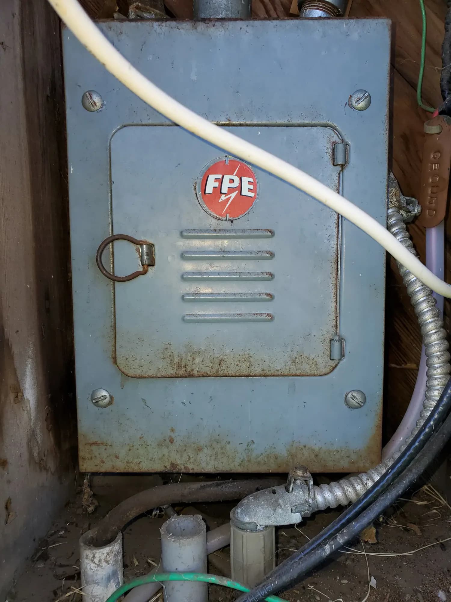 Older exterior panel enclosure with a Federal Pacific Electric label